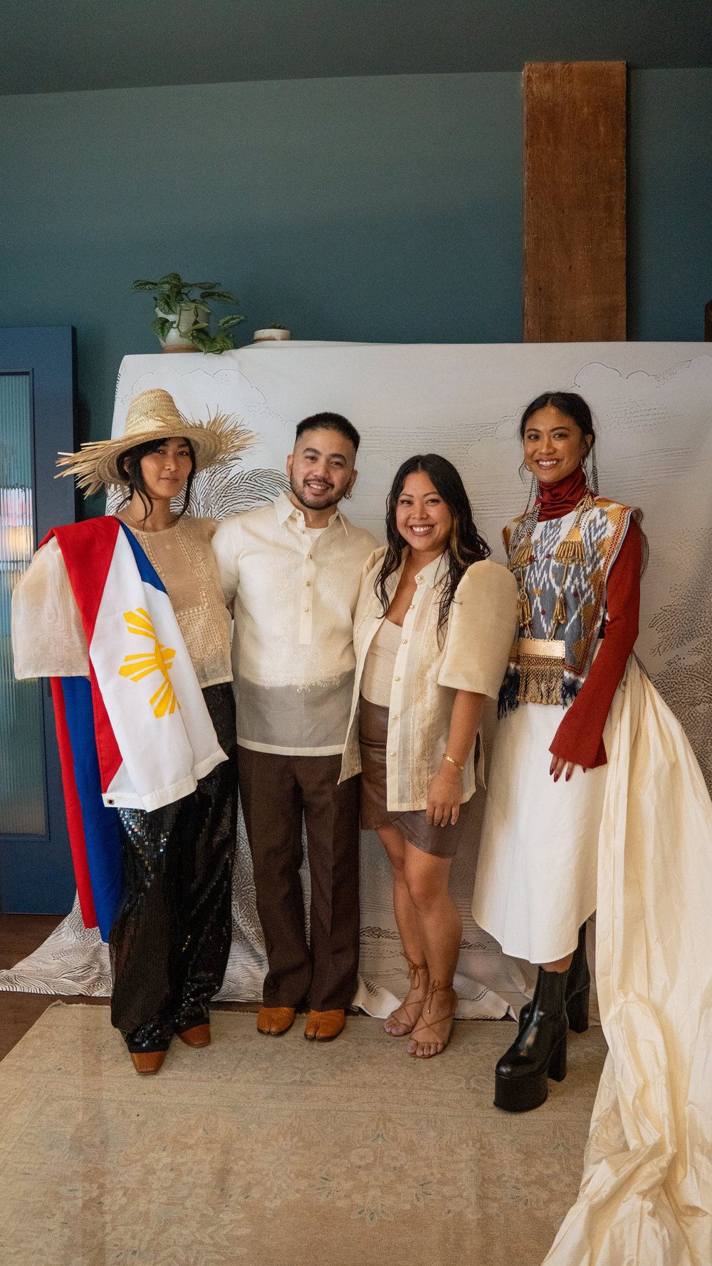 Guests at the Prologue backdrop