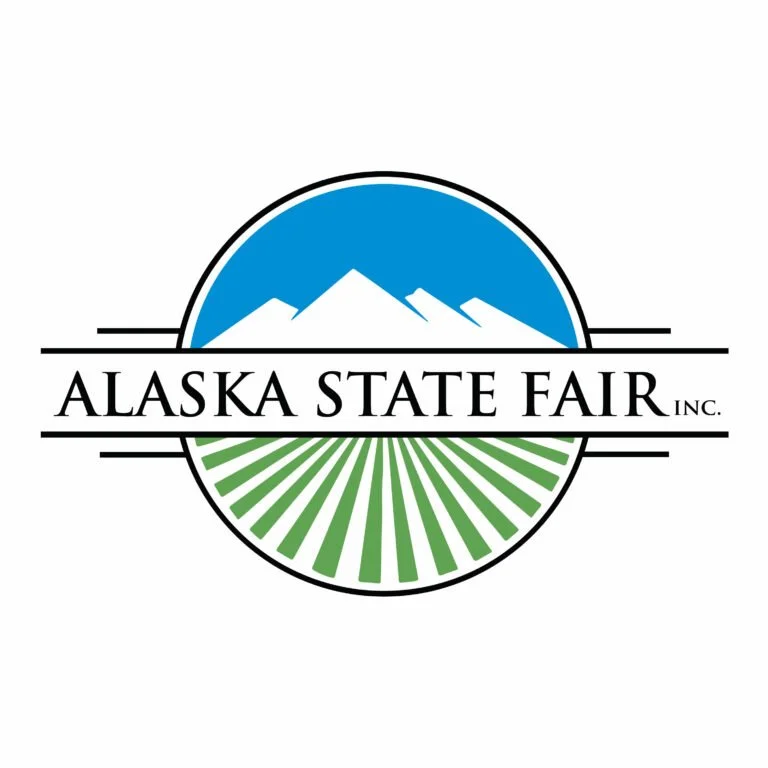 Logo of the Alaska State Fair featuring a mountain range, a sun or moon, and green fields.