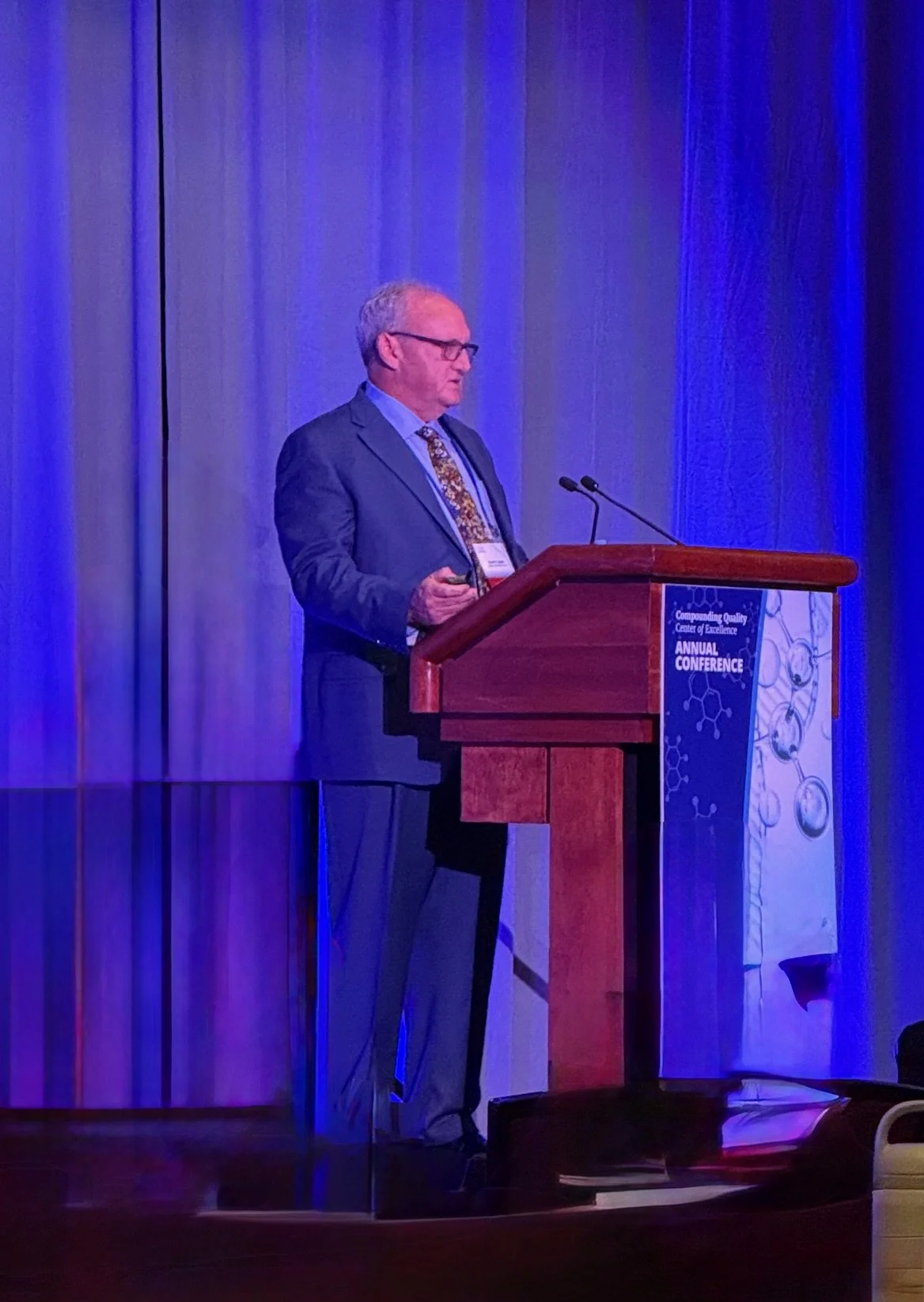 Travis A, Leeah, founder of Leeah Consults LLC, at the FDA 2025 Annual Conference as a featured panelist giving a speech.