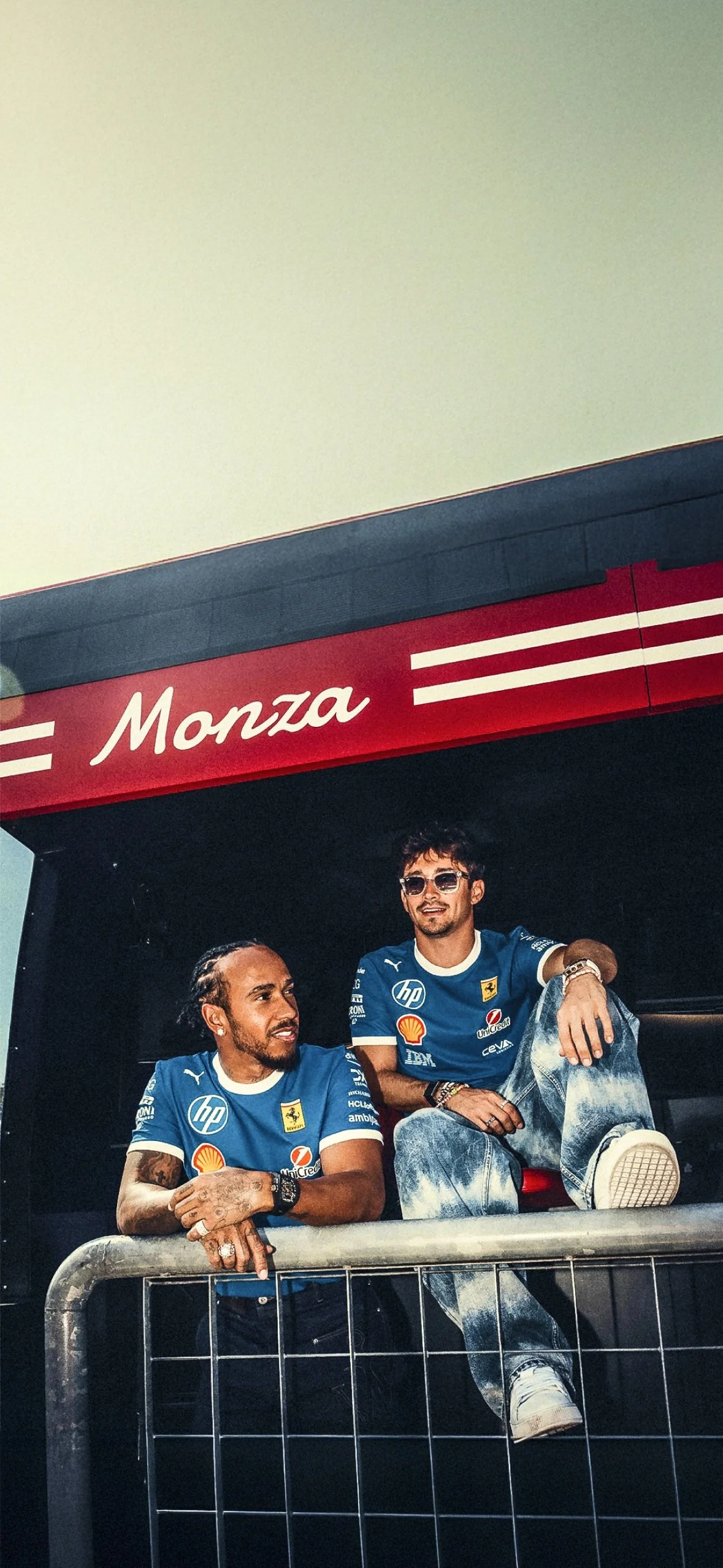 Download a free high-resolution Formula 1 wallpaper of Lewis Hamilton and Charles Leclerc driving for Ferrari in the 2025 season. Updated daily by F1 Ocean. Explore the full collection at f1ocean.com . Team: Ferrari Driver: Lewis Hamilton, Ch