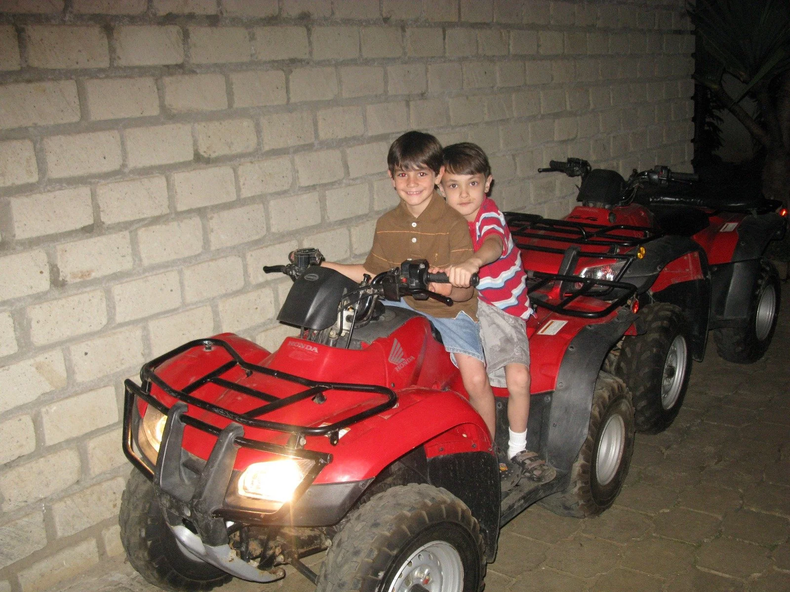 My cousin and I on his ATV, 2008