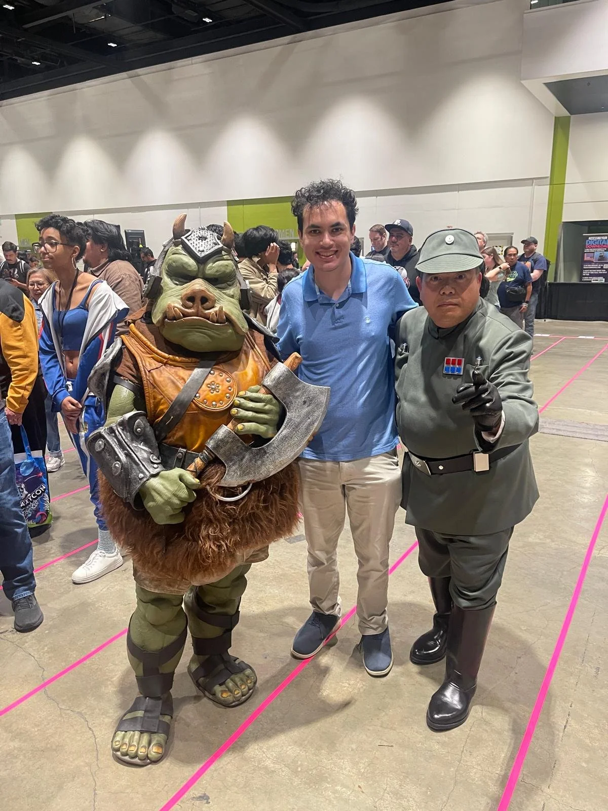 Cosplayers from the non-profit 501st Legion as a Gamorrean Guard and Imperial Officer from the Star Wars Franchise in Galaxy Con, 2025