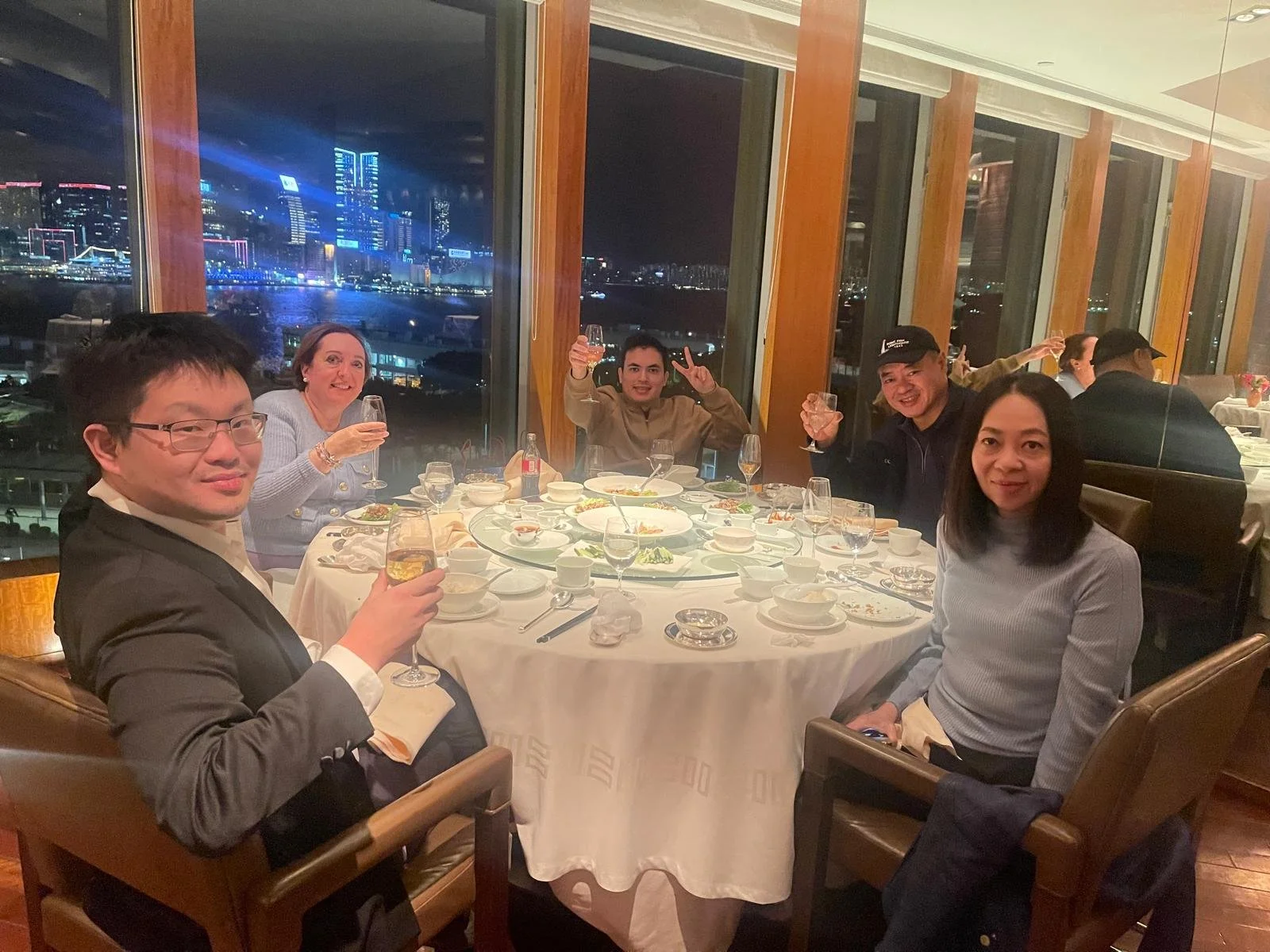 My paternal aunt, cousin, and my parents at a restaurant in Hong Kong, 2025
