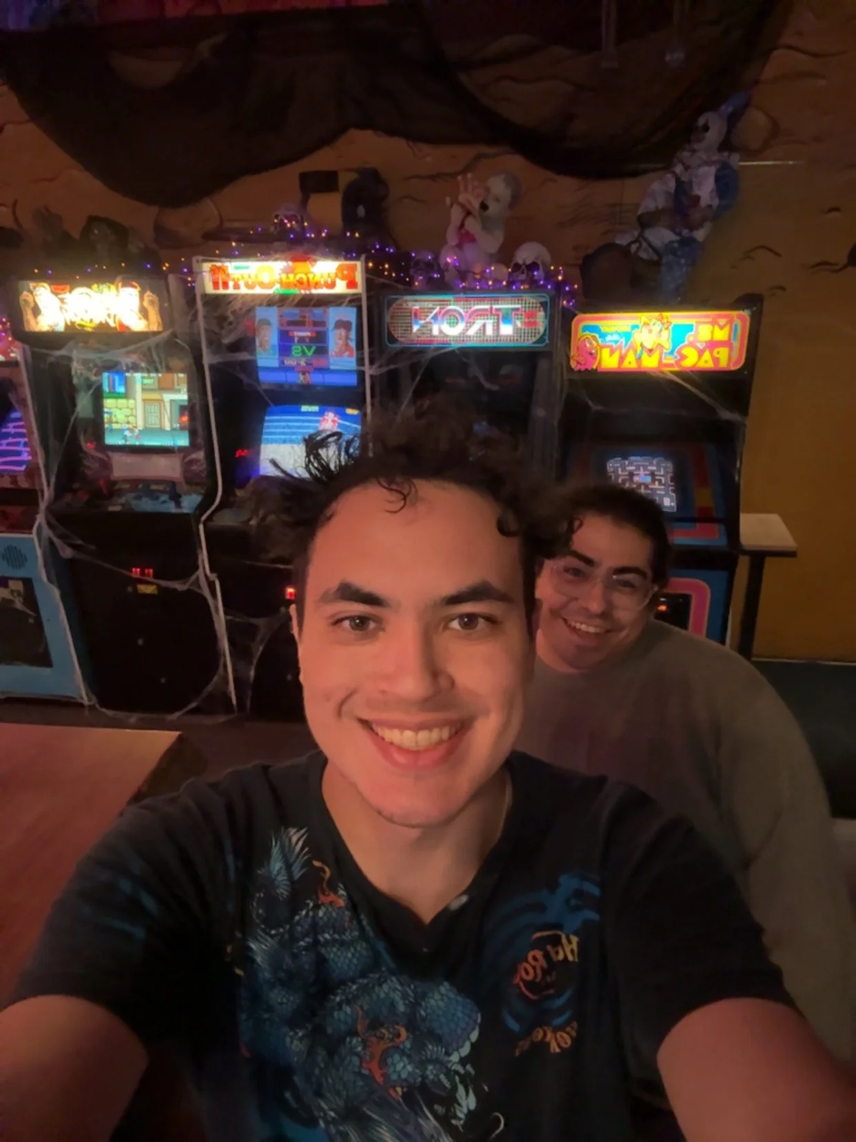 My friend and I at MINIBOSS Arcade during Halloween in Downtown San Jose, 2025