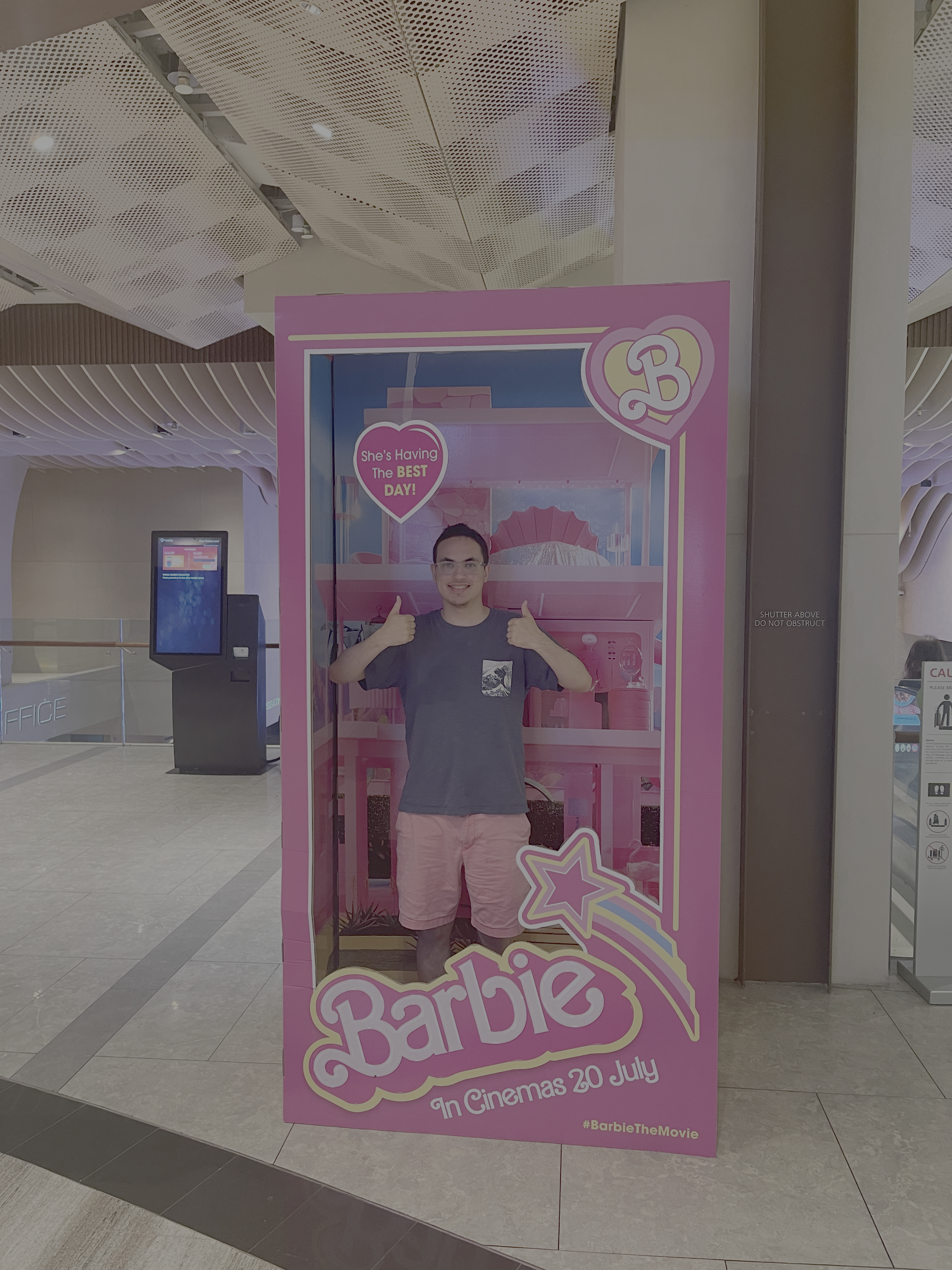 Me posing in Greta Gerwig's Barbie promotional piece at Changi Jewel Theater in Singapore, 2023