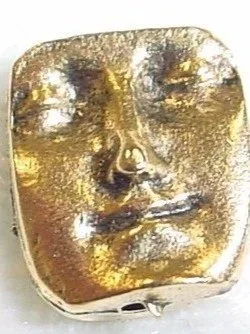 Peaceful Face signature bead in Kate Stockman Designs story driven jewelry