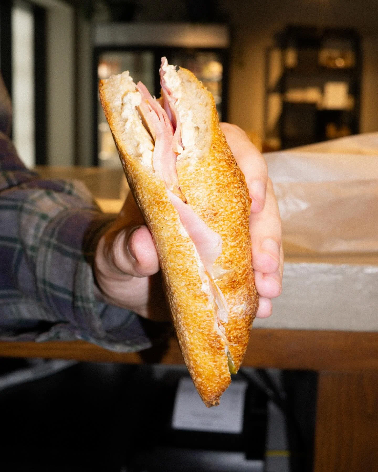 Feature Sandwich
This week we&rsquo;re introducing a new style of feature: A freshly baked sourdough demi-baguette filled with ham, St. Mary&rsquo;s grand trunk cheese, house-made cultured butter, dijon, and cornichon. Limited batch available daily.
