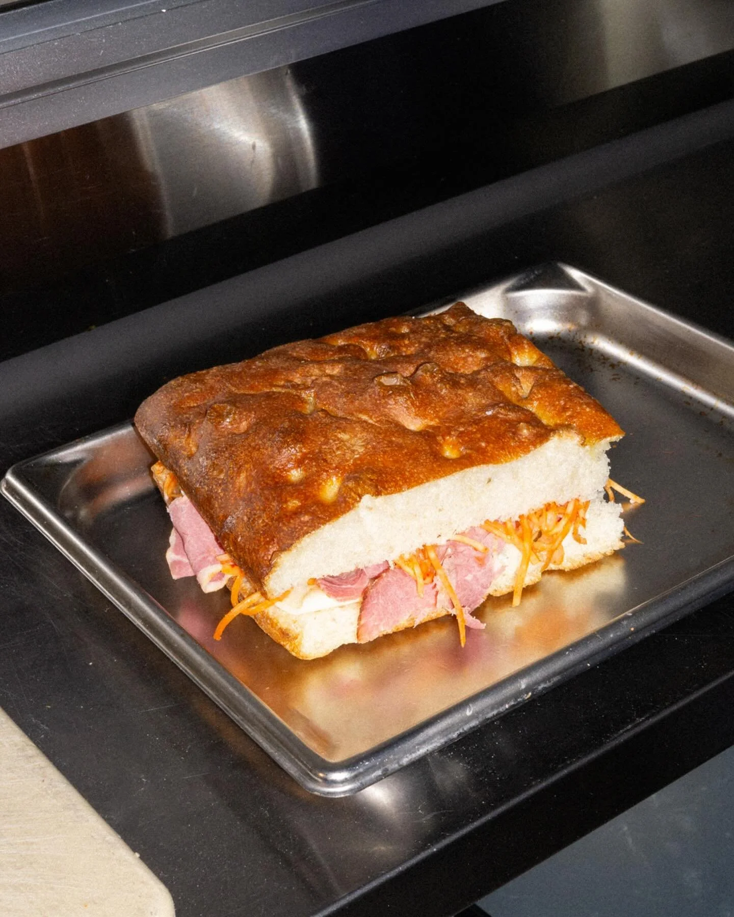 Feature Sandwich
House-made slow roasted brisket, scallion aioli, kimchi &amp; celeriac slaw, and provolone. Get it while it lasts!