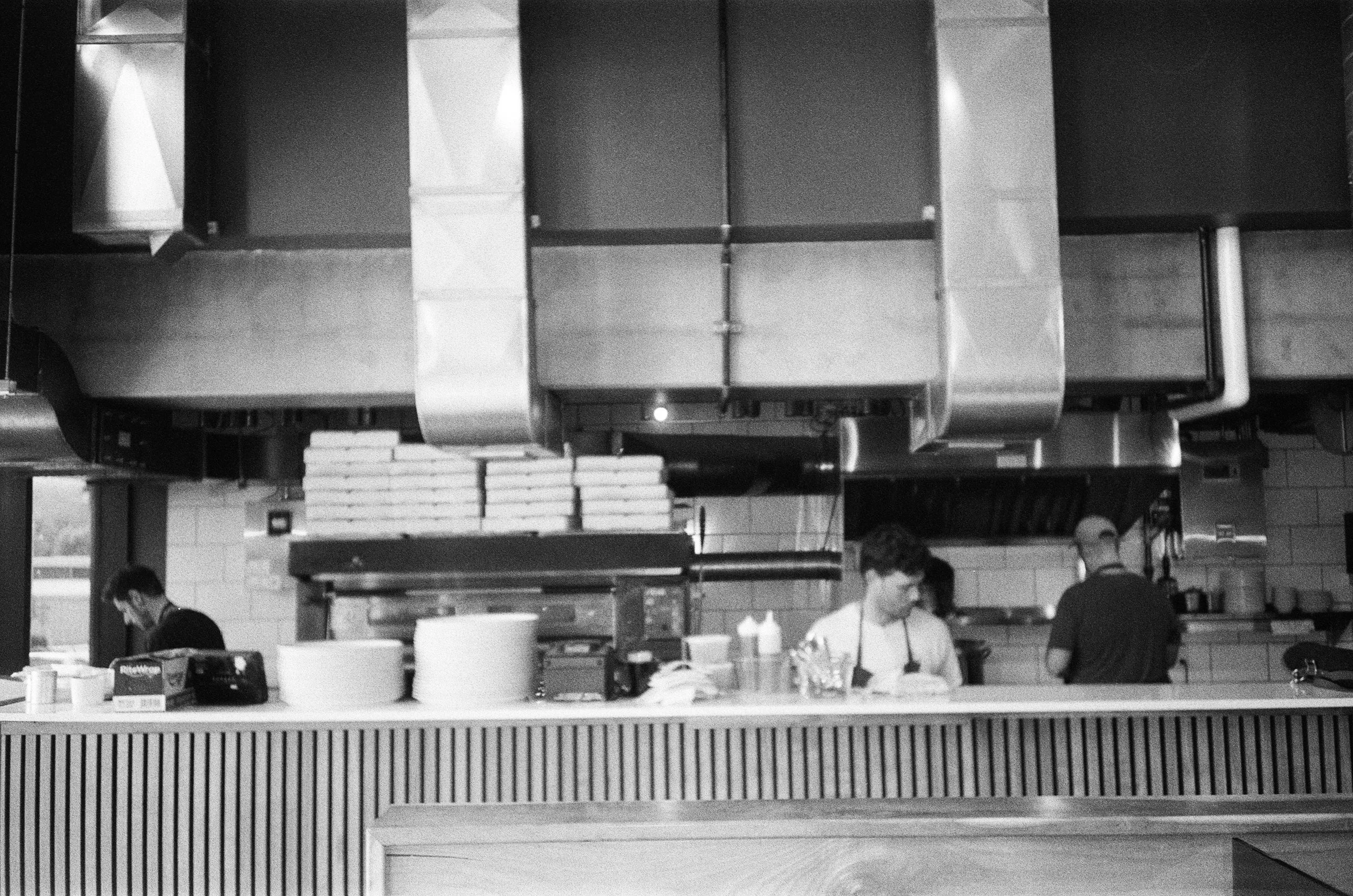 chefs in the kitchen, pizzeria madre