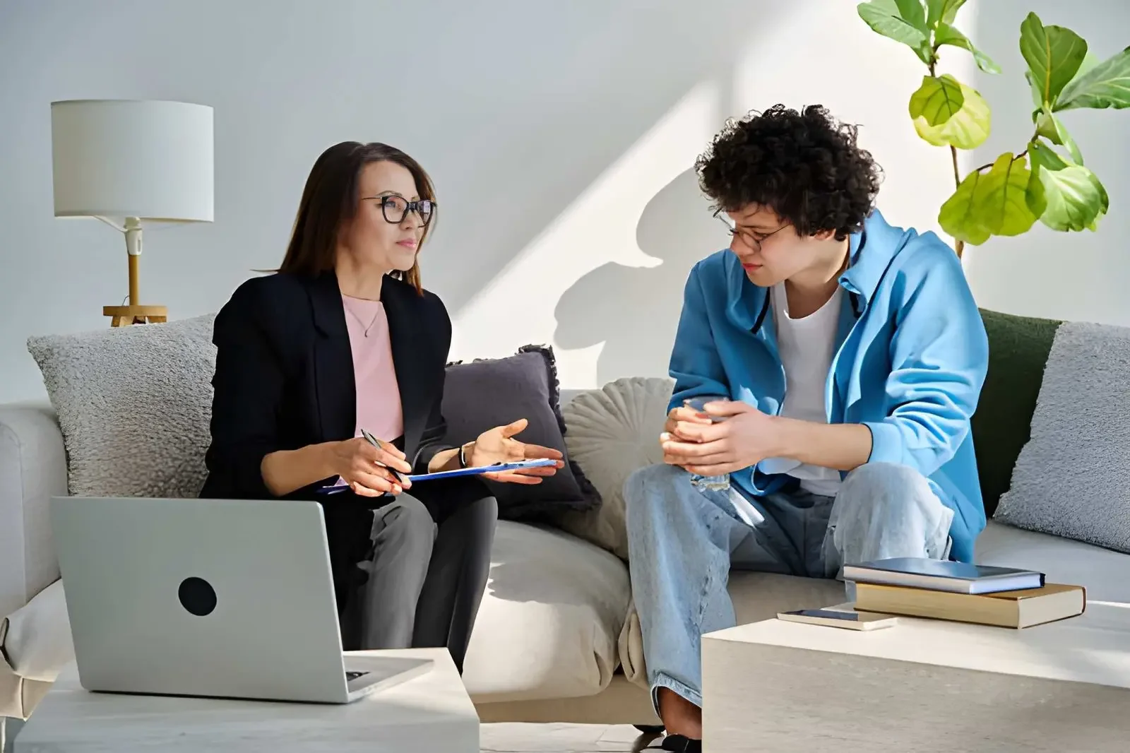 A young boy in session with his therapist