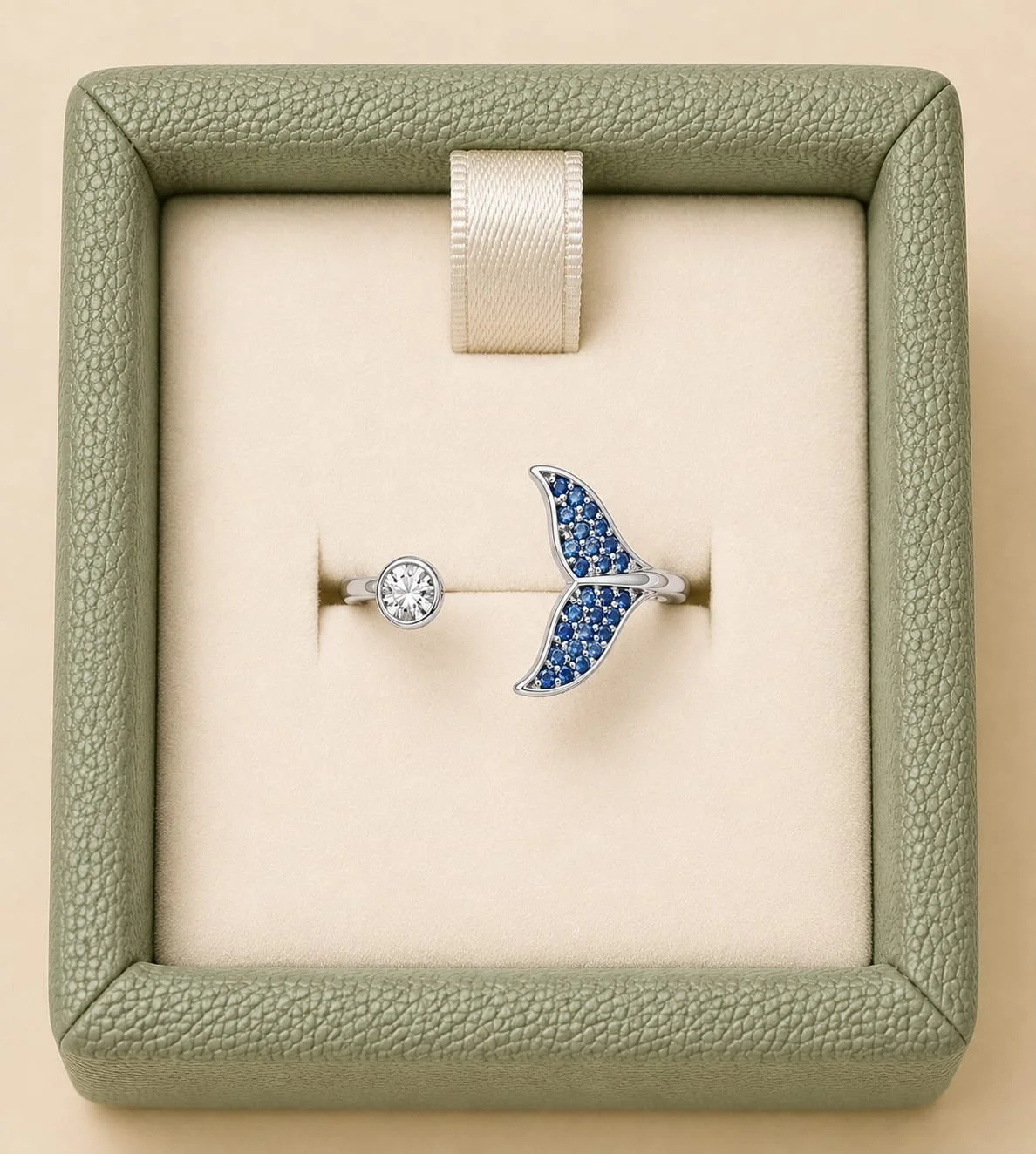 The Whale Tail Sparkle ring in Blue