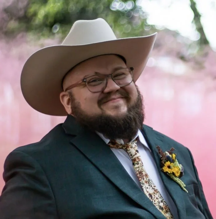 Logo for Aftercare Therapy Collective featuring a stylized crown made of three interlocking crown pieces, with the text ‘Aftercare Therapy Collective’ in gold on a black background.