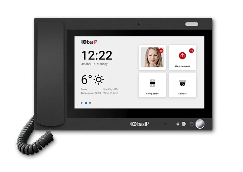 Digital intercom or smart home security panel with touchscreen display showing time, date, weather, and various icons for photo, alarm messages, calling panels, and cameras.