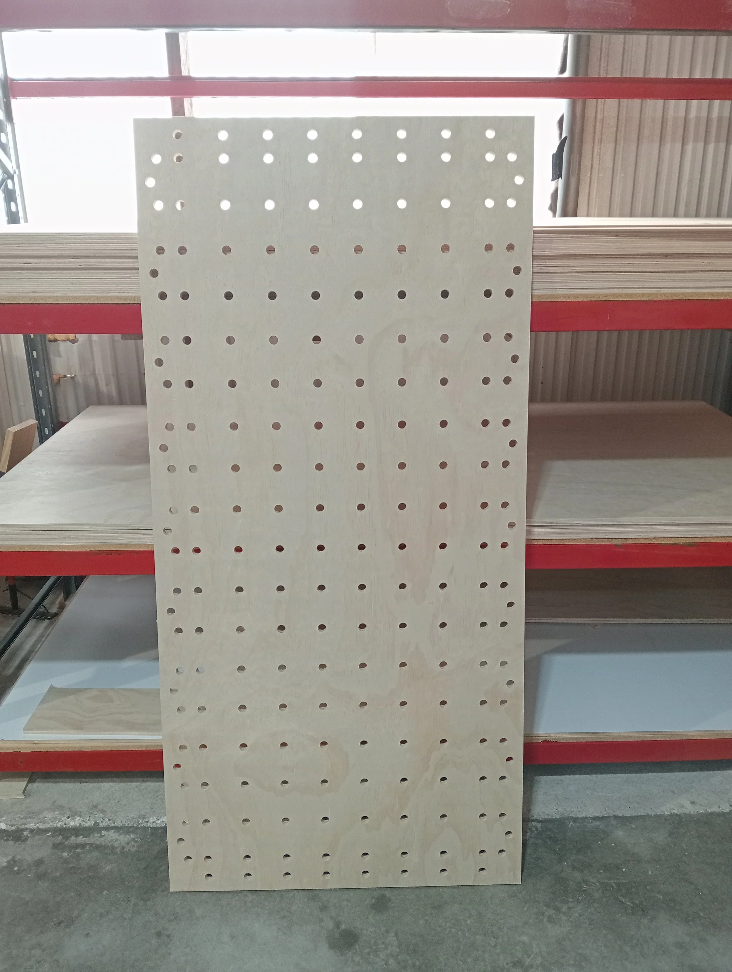 CNC router cutting plywood sheet for signage in New Zealand.