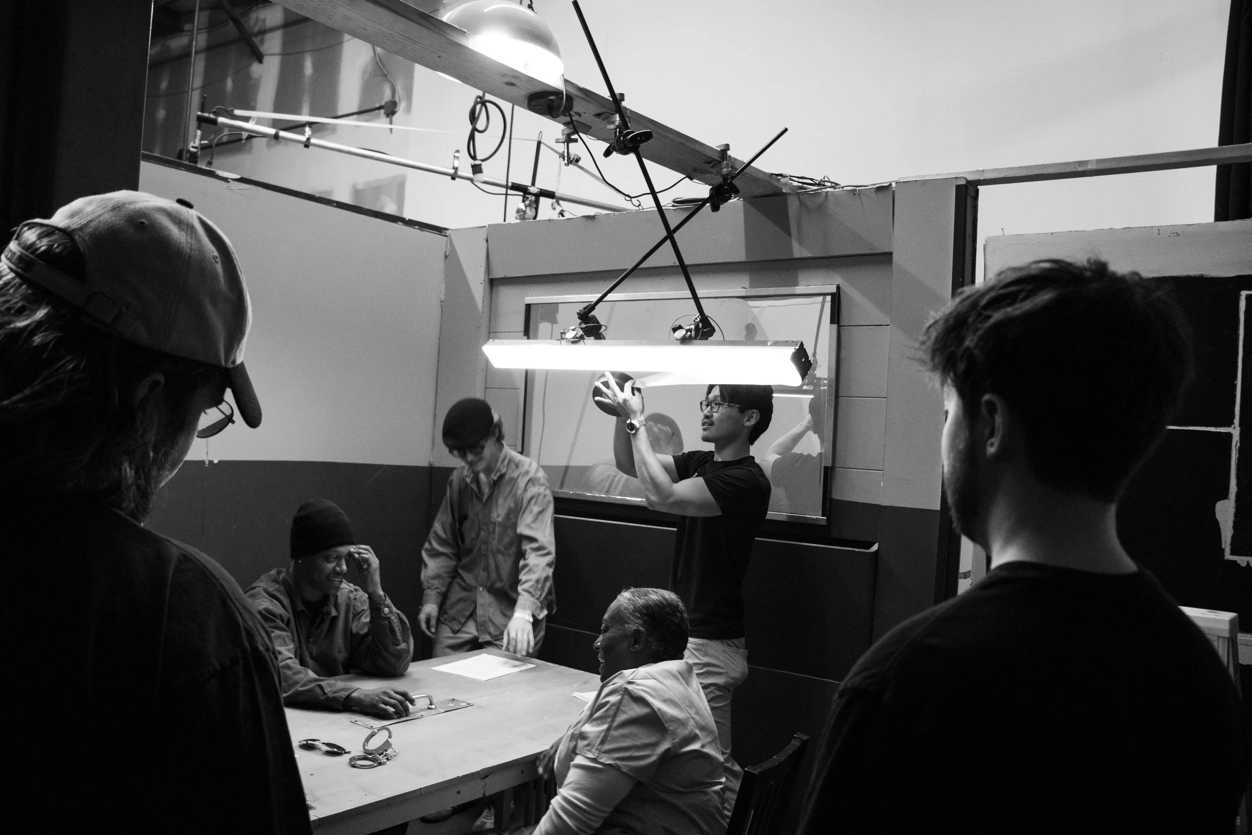 Indianapolis gaffer setting up lighting equipment professionally