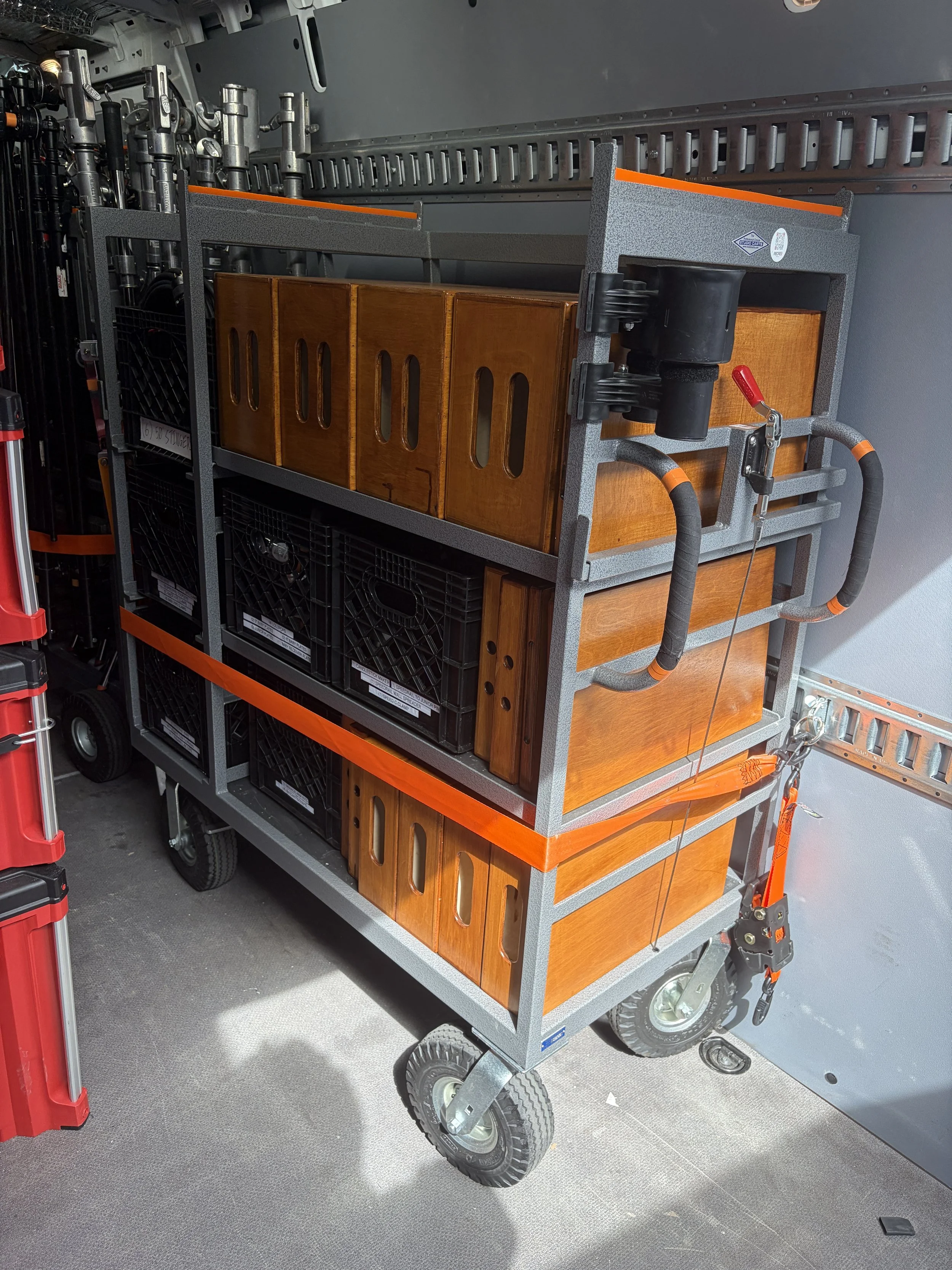 Studio carts micro duz all cart with apple boxes, matthews combo stands, and grip equipment in a Indianapolis 1 ton grip truck