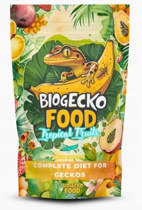 A colorful bag of Biogeco Food Tropical Fruits for geckos, with a cartoon gecko holding a banana and surrounded by tropical fruit illustrations.