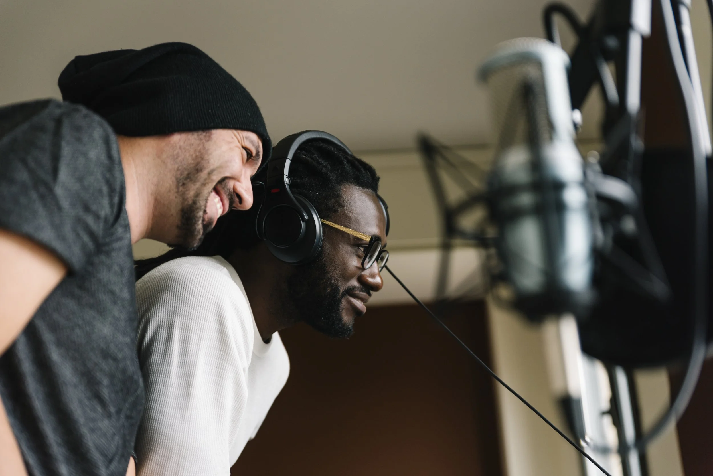 men-listening-music-while-standing-studio.jpg