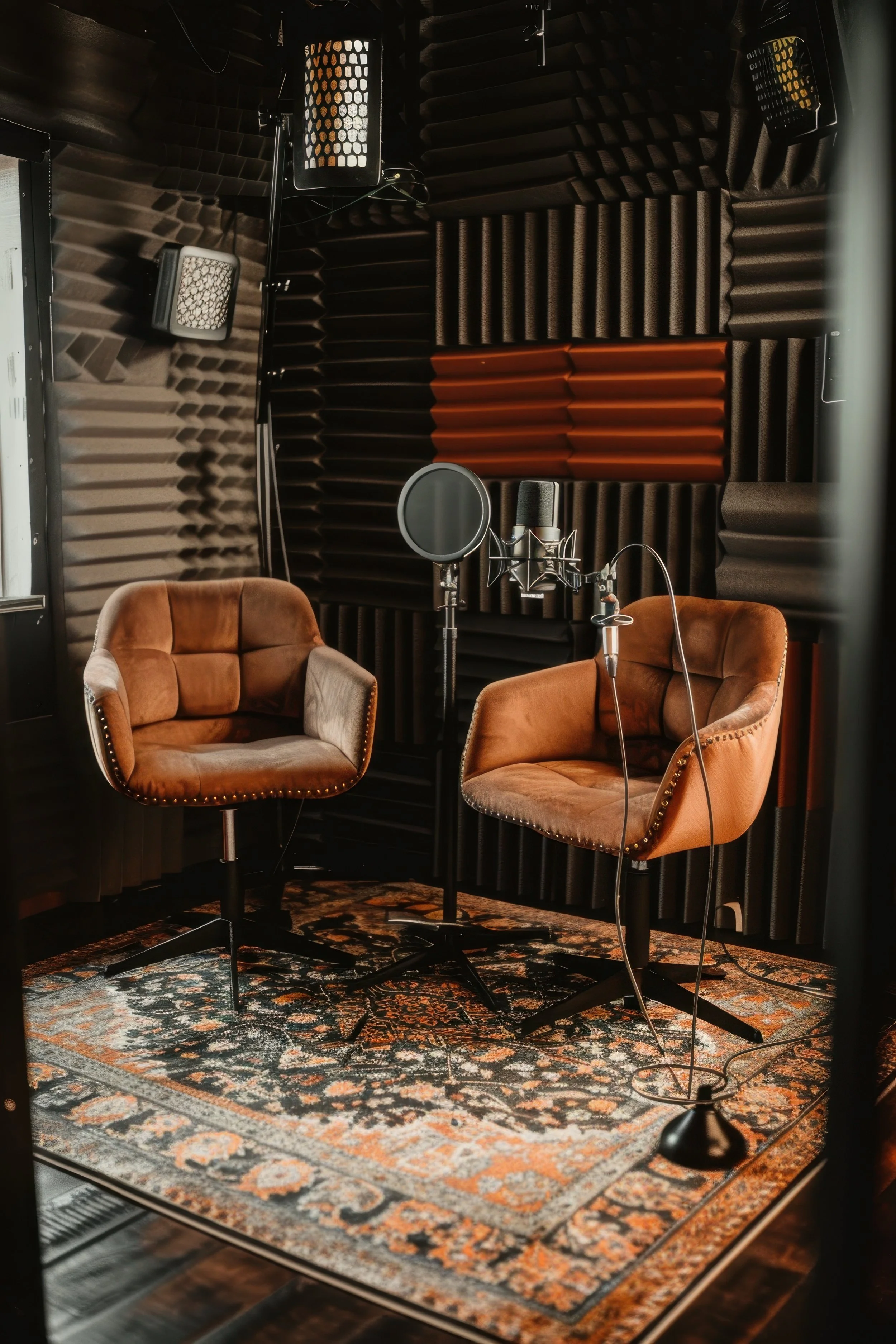 cozy-podcast-studio-with-two-chairs-two-microphones.jpg