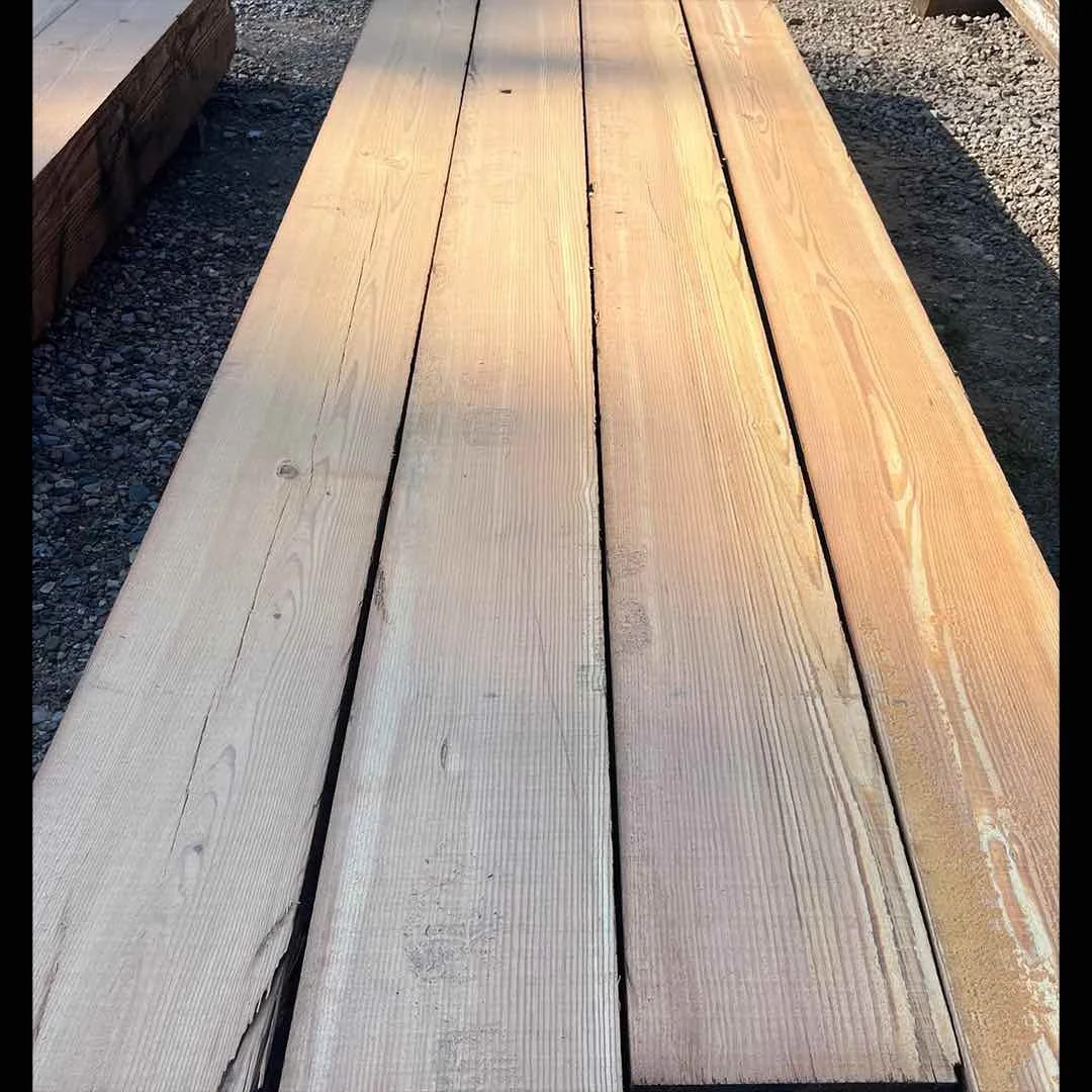 Select antique reclaimed longleaf pine boards with tight growth rings, clear grain, and no visible knots.