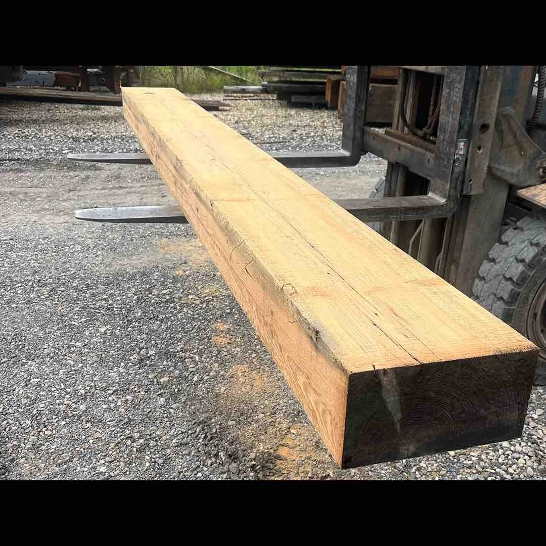 Thumbnail of resawn antique reclaimed industrial timber beam with visible old-growth grain, displayed on a forklift in a lumber yard.