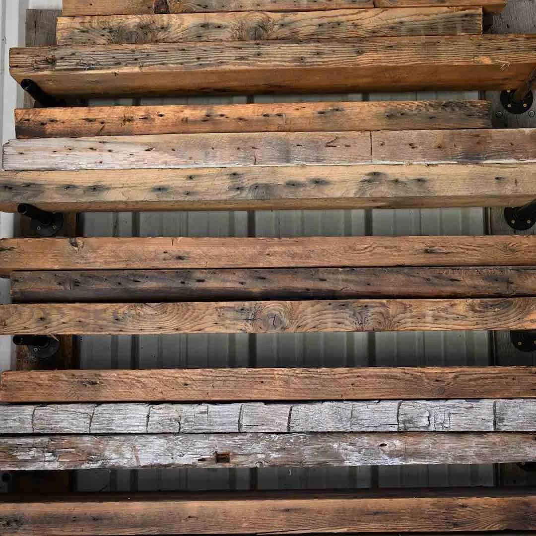 Thumbnail of stacked antique reclaimed floating shelf boards with visible nail holes, tool marks, and aged character.