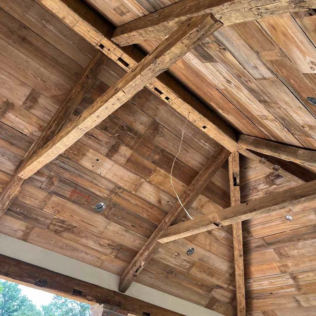 Thumbnail of antique reclaimed hemlock and white pine beams used in a client's exposed truss ceiling installation.