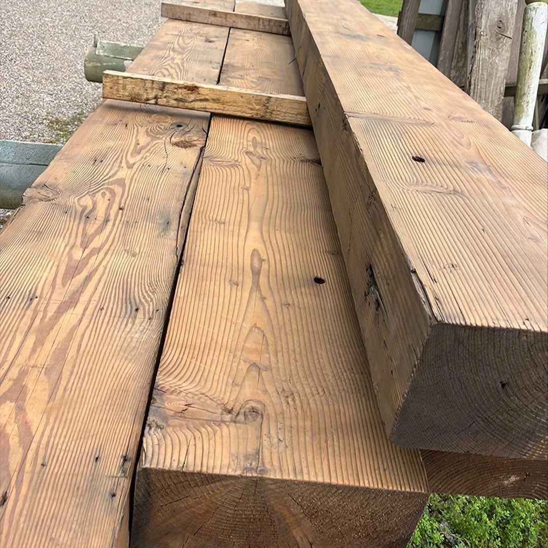 Thumbnail of antique reclaimed industrial timbers with visible grain lines and natural aged character, showcasing tight growth rings and authentic old-growth lumber surfaces.