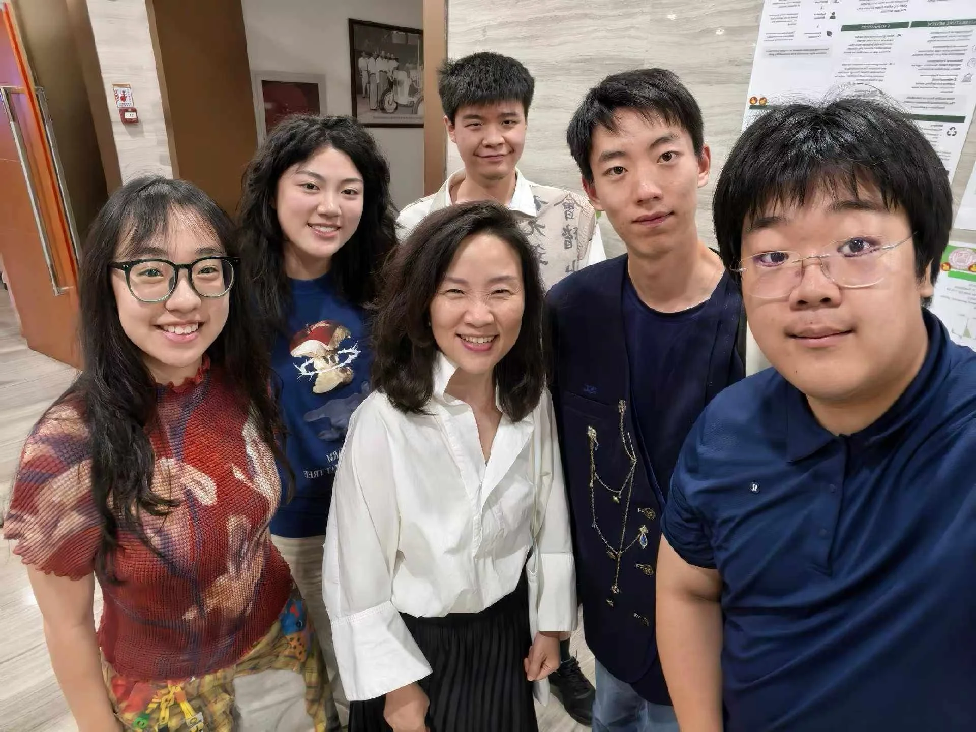 Wen Xin, Yuqing Bai, Zhijun He, Qianli Xu and Yilun Wang with Professor Xu Xiuli at CIDGA, July 2026