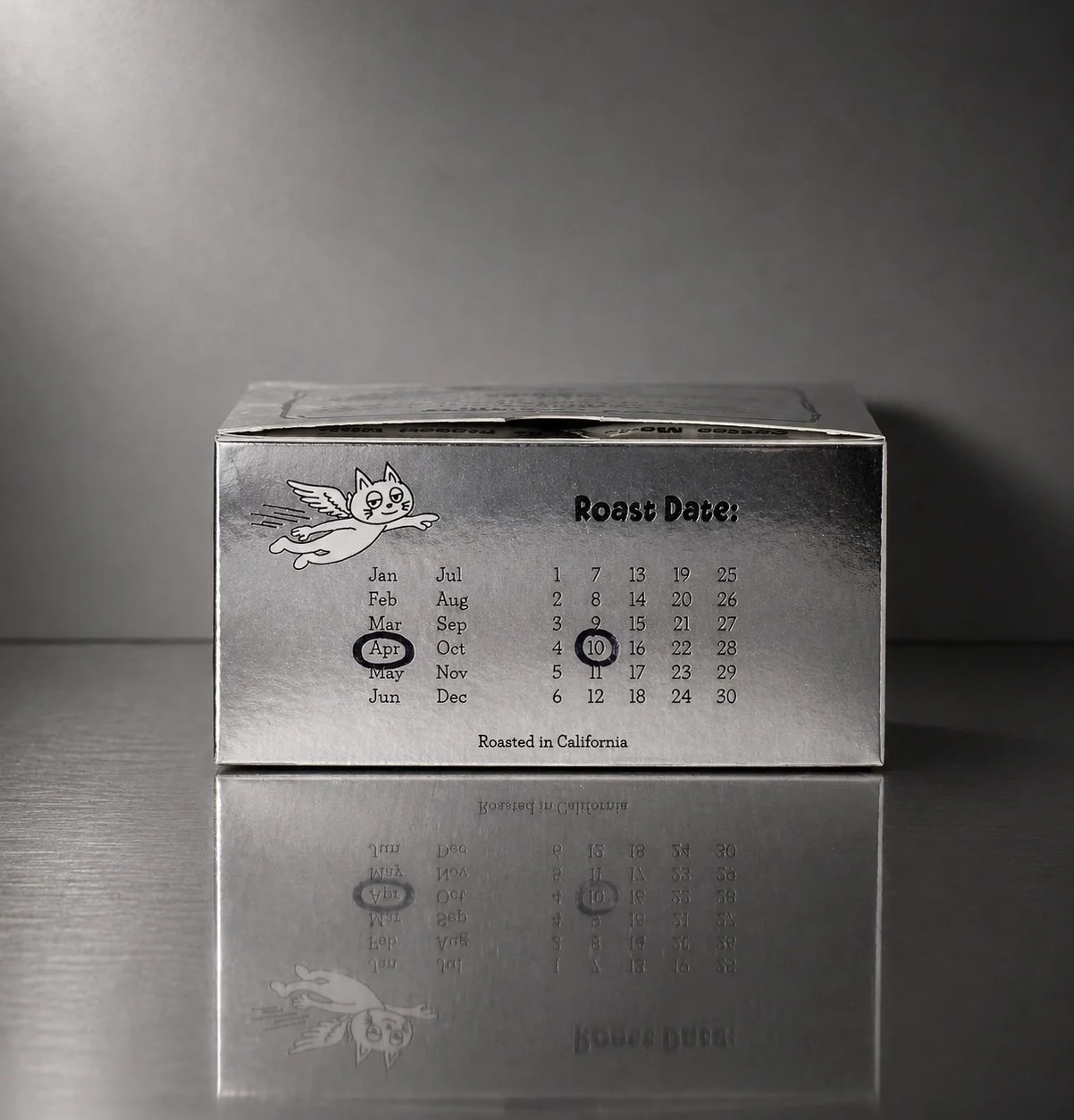 ethiopia-yirgacheffe-coffee-ovvpremium Ethiopia Yirgacheffe coffee box reflected on dark metallic surface in studio lightingi-top.jpg