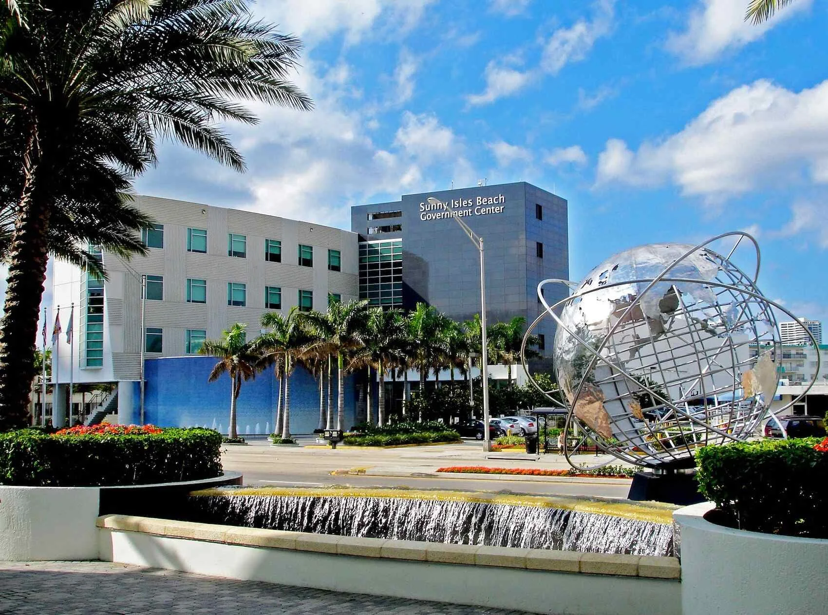 A sunny day view of the Sunny Isles Beach Government Center, representing the heart of a community where Mobile IV Nurse provides convenient mobile IV therapy and hydration.