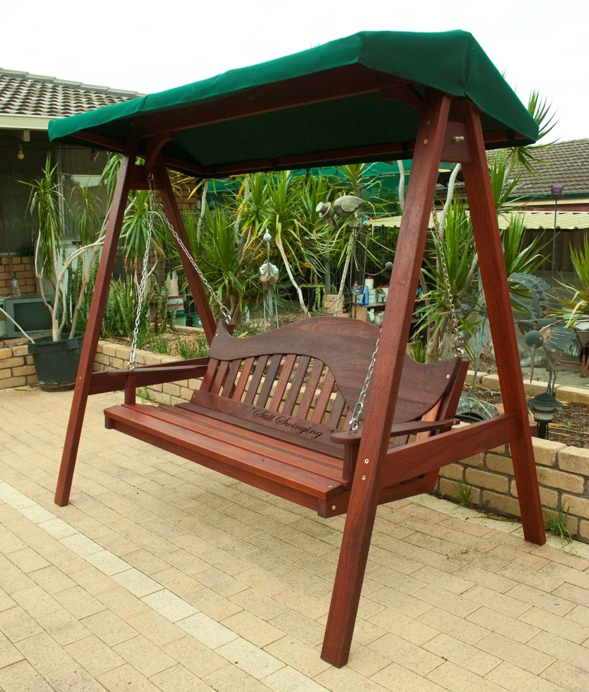 Whaleback swing with engraved message _still swinging_