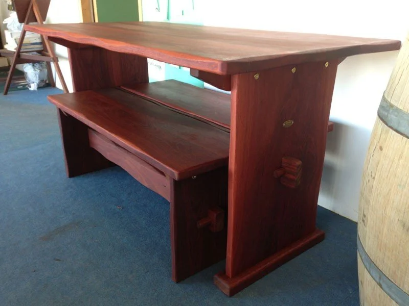 Custom made 4 seat Alfresco outdoor table with solid timber benches for a protected outdoor area.