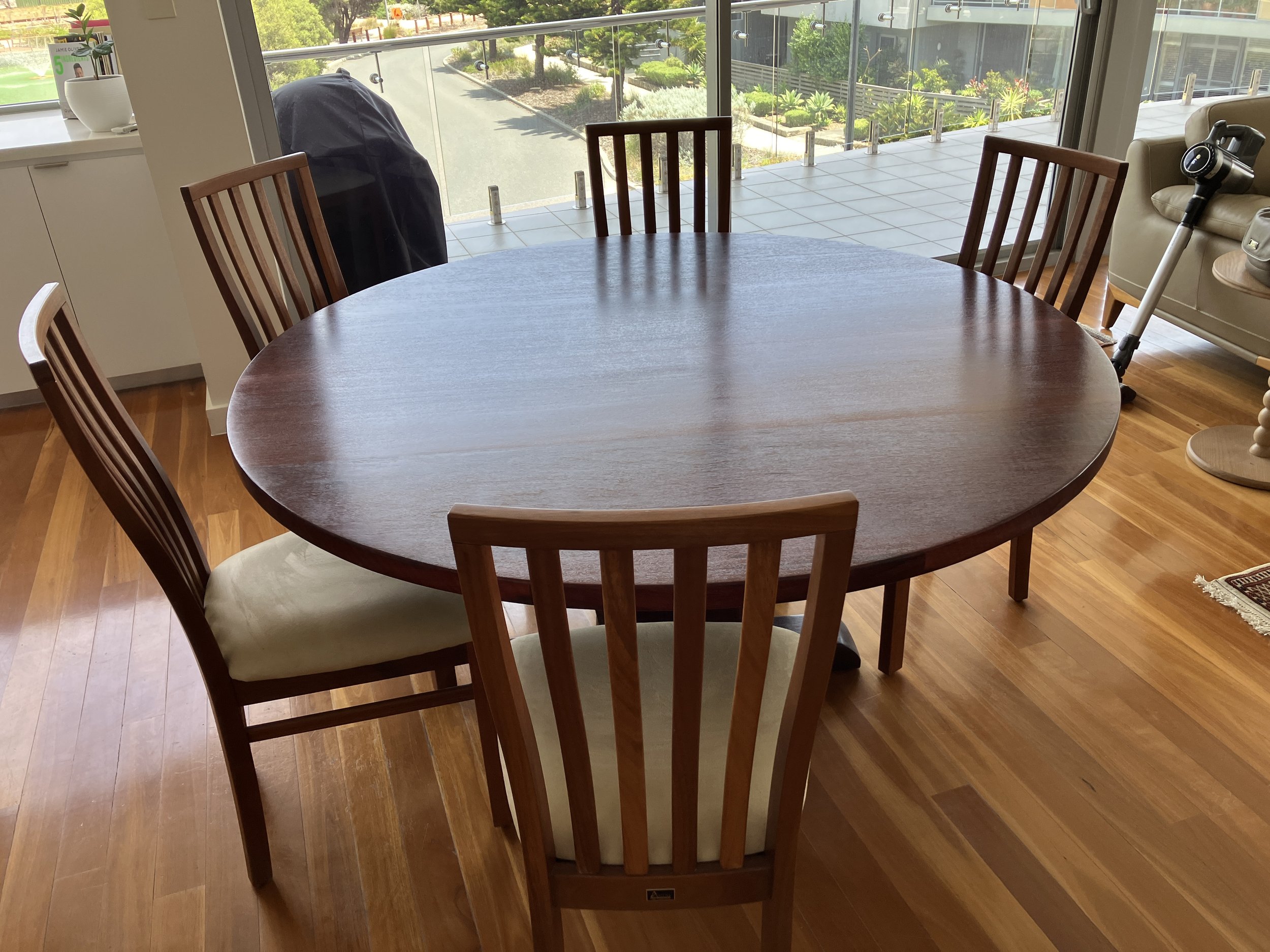 Round Jarrah table made using timber from customers old table