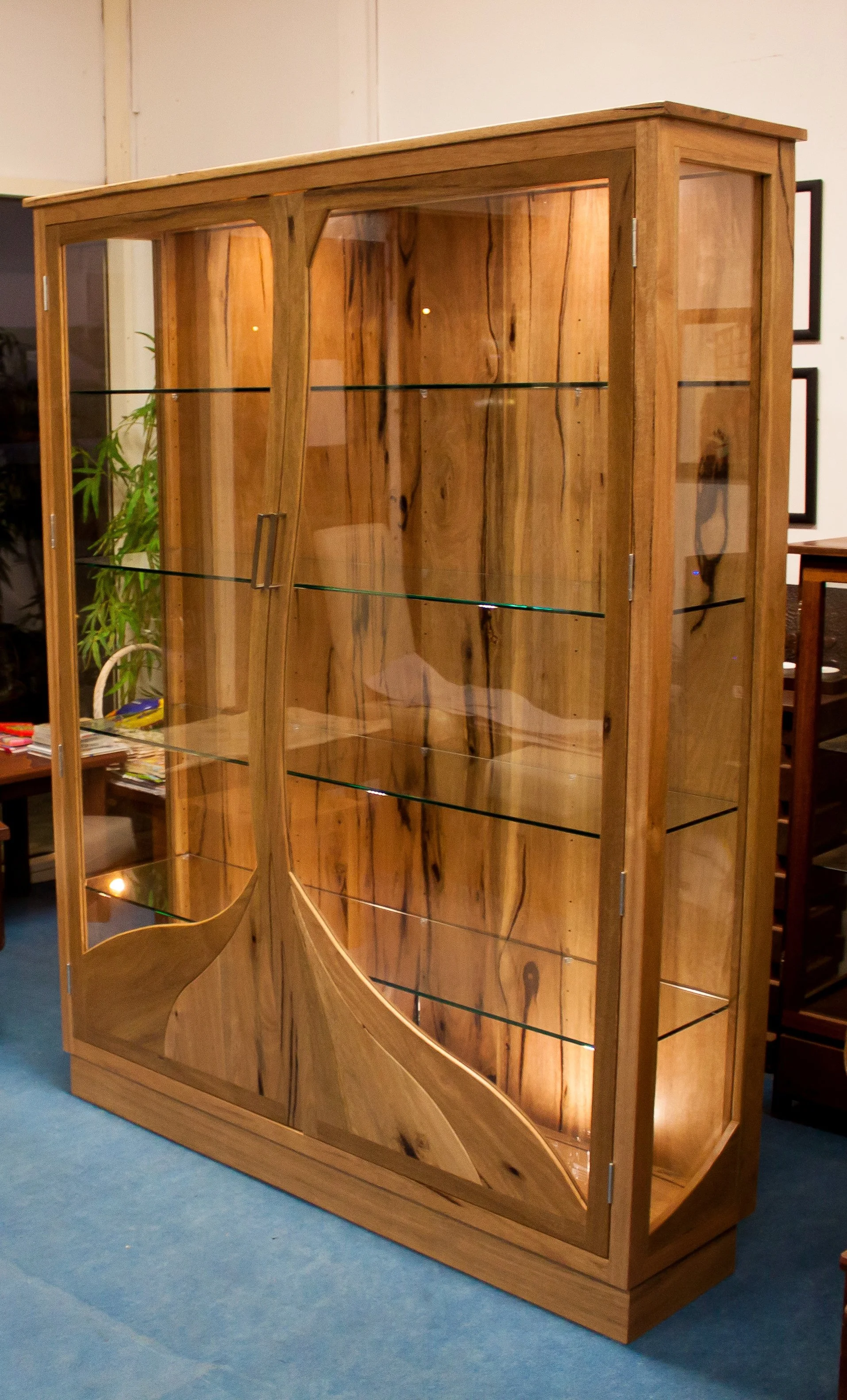 WA Marri display case with glass shelves, up and down lighting