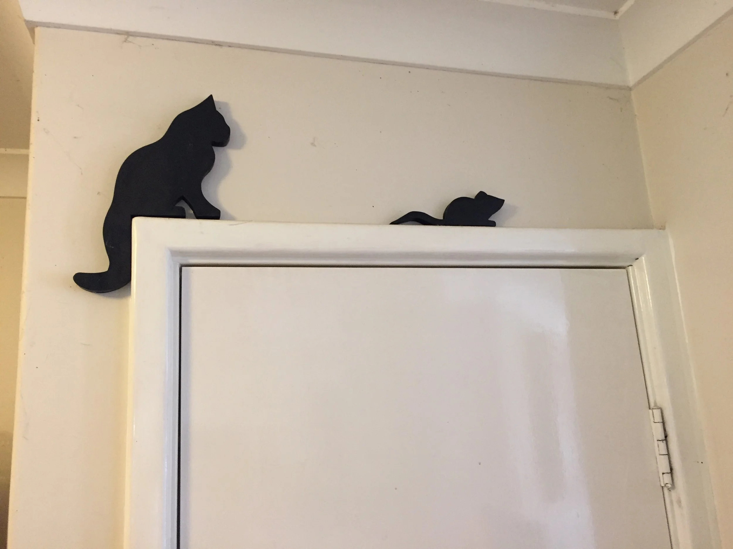 Shadow cat and mouse door toppers