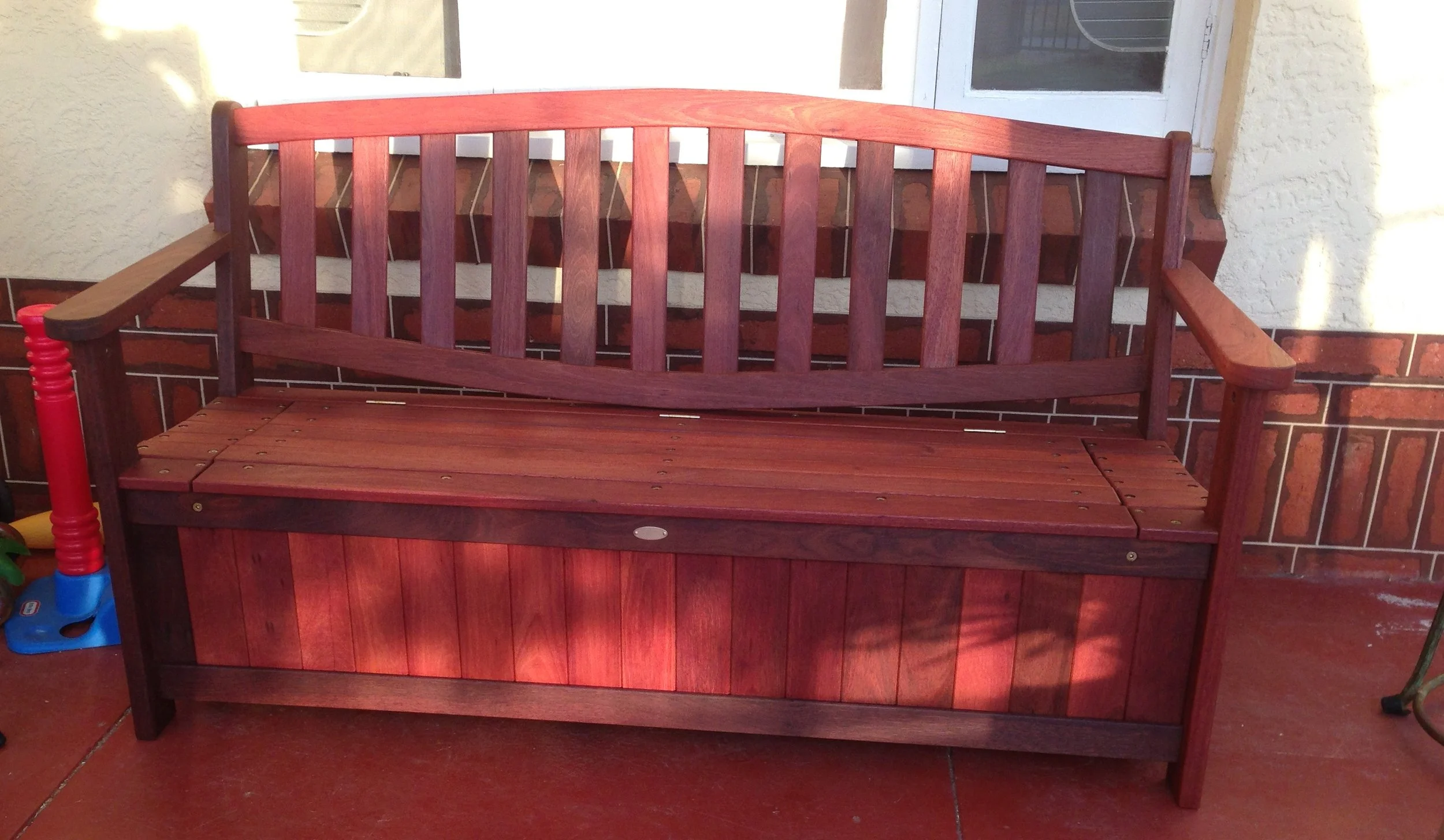Clives Jarrah storage bench with oval backrest and opening lid