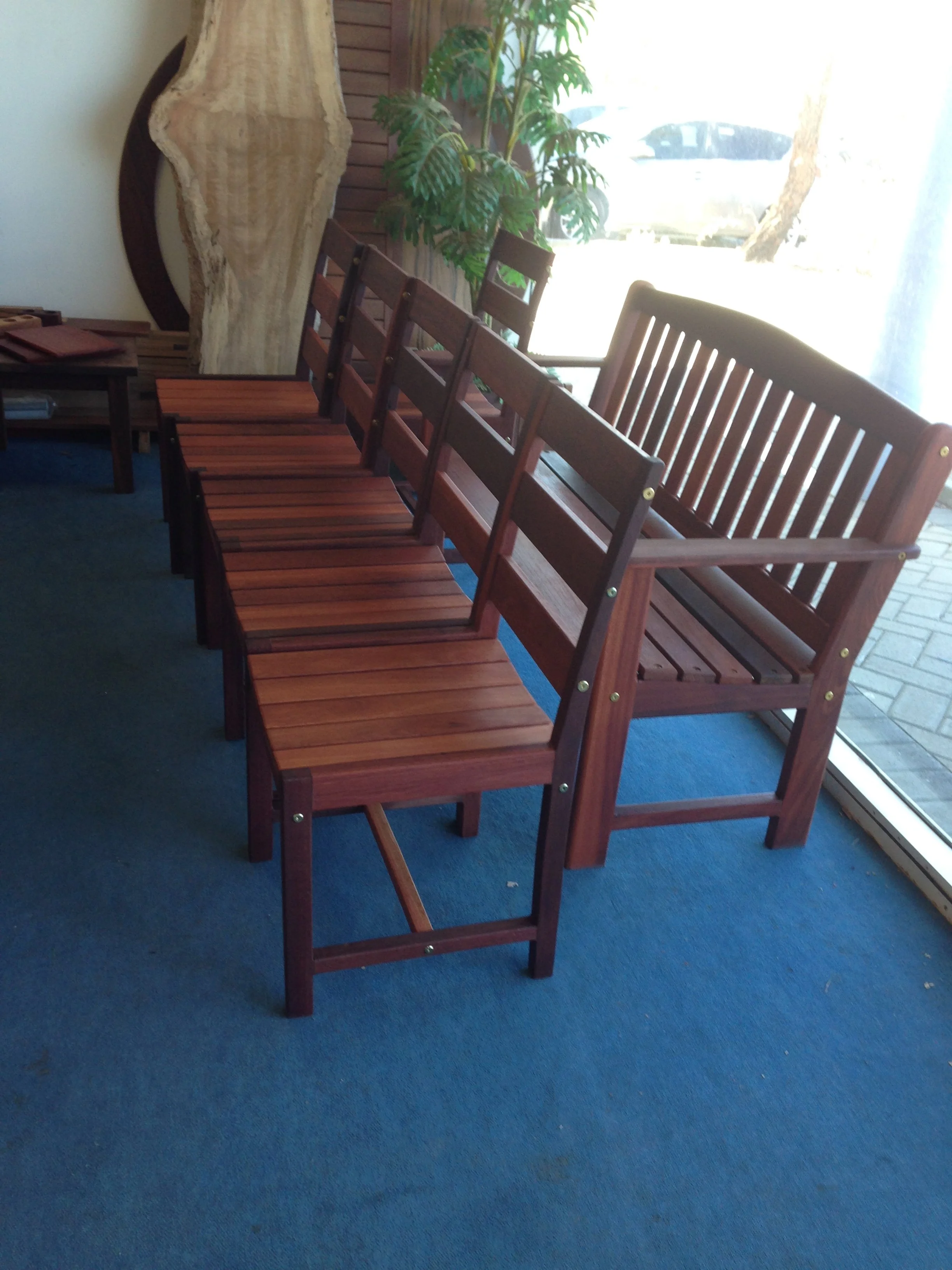 Custom Jarrah Tracey chairs with Clive's bench in the back ground
