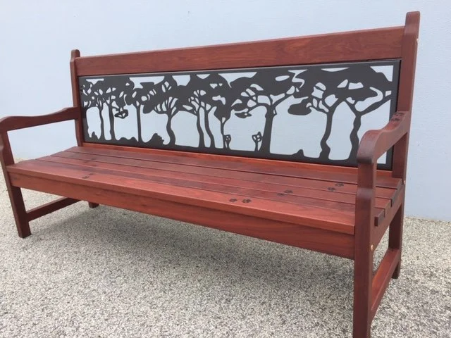 Jarrah Nottinghill Memorial bench with Msasa trees and cat paw prints