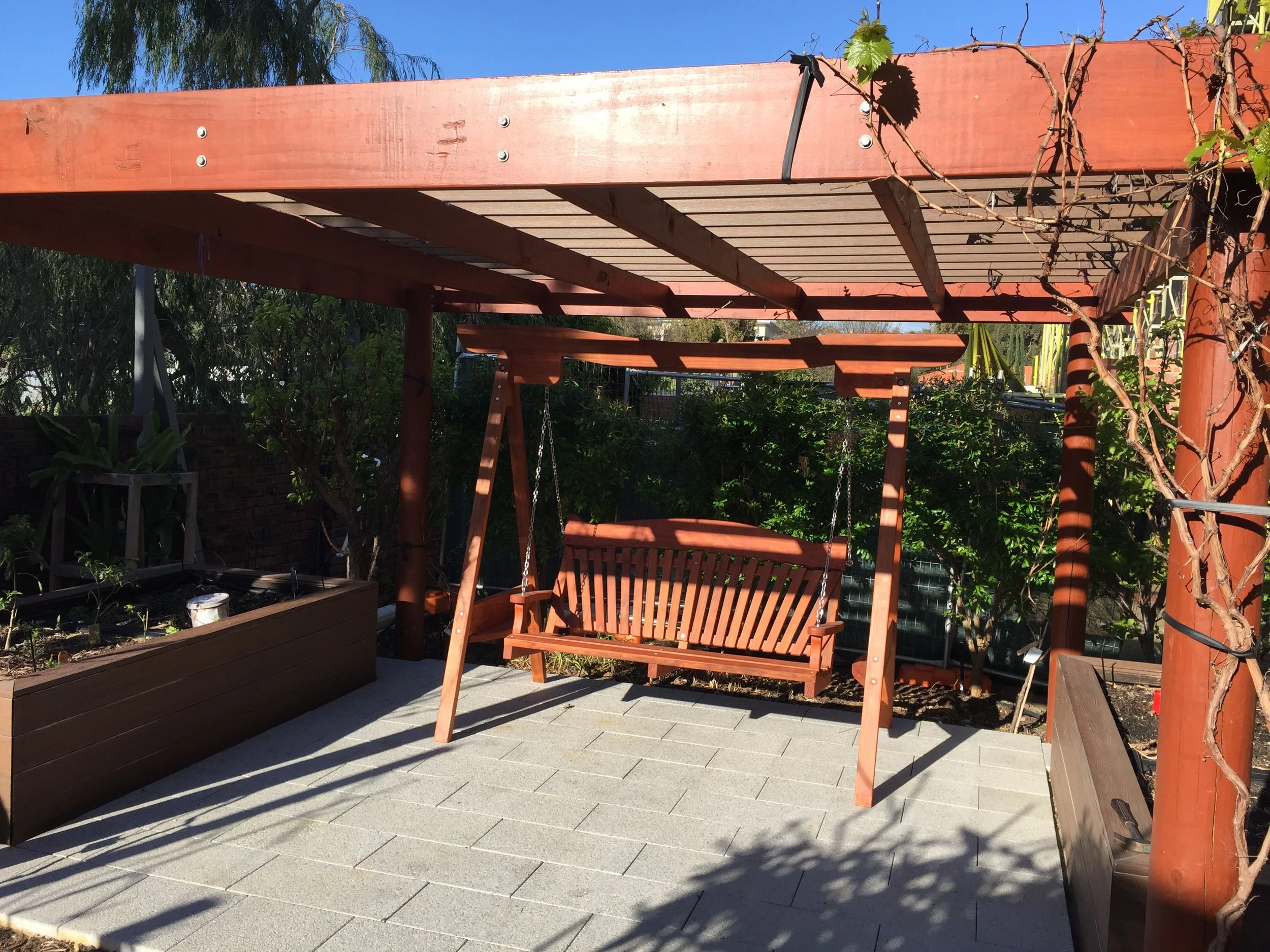 Sunrise swing with Woca Red brown colour