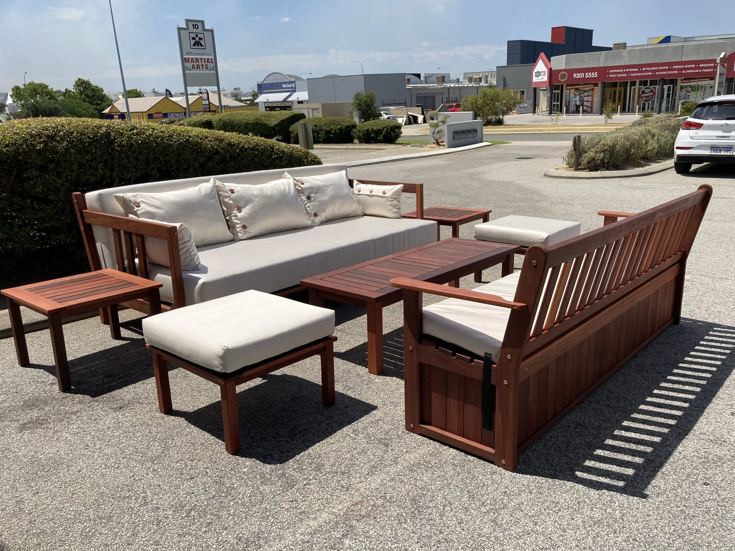Daybed with side tables, ottomans, coffee table and storage bench
