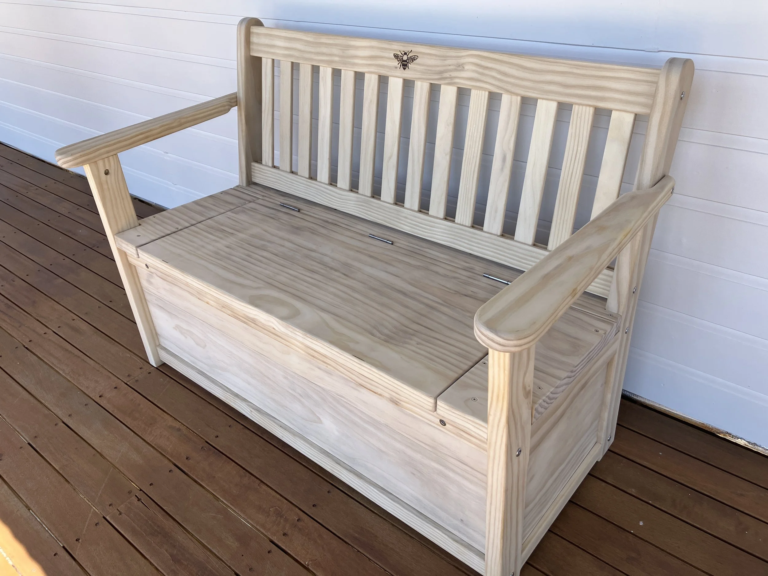 Accoya Clive's storage bench with bee engraving