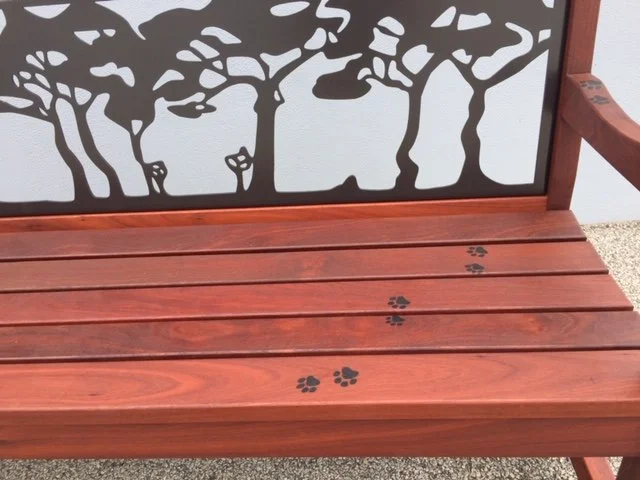 Custom Jarrah Nottinghill memorial bench showing cat paw prints