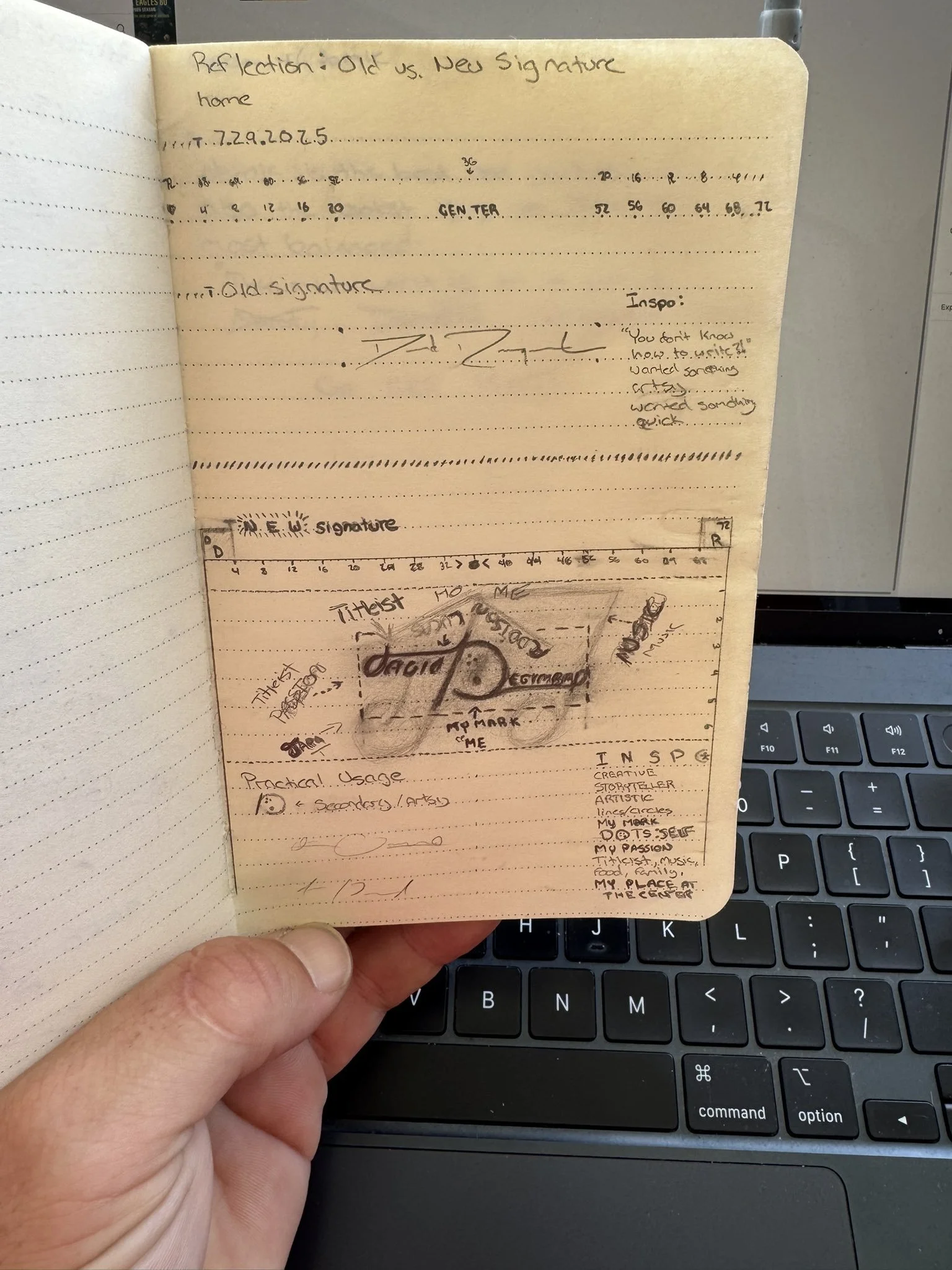 A person's hand holding an open notebook with handwriting and sketches on a page titled 'Reflection: Old vs. New Signature home.' The page features handwritten notes, signatures, a doodle in the center, and a list of practical usage notes. A laptop keyboard is visible below the notebook.