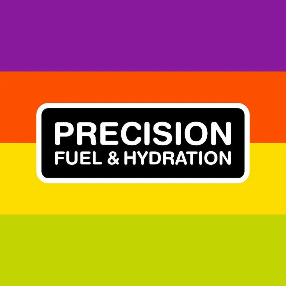 Precision Fuel & Hydration Logo with the text 'Precision Fuel & Hydration' on a black background, divided into purple, red, yellow, and green horizontal stripes.