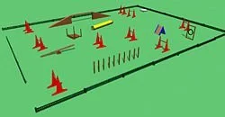 Hindernisparcours auf einer grünen Wiese mit roten, blauen und gelben Hindernissen.