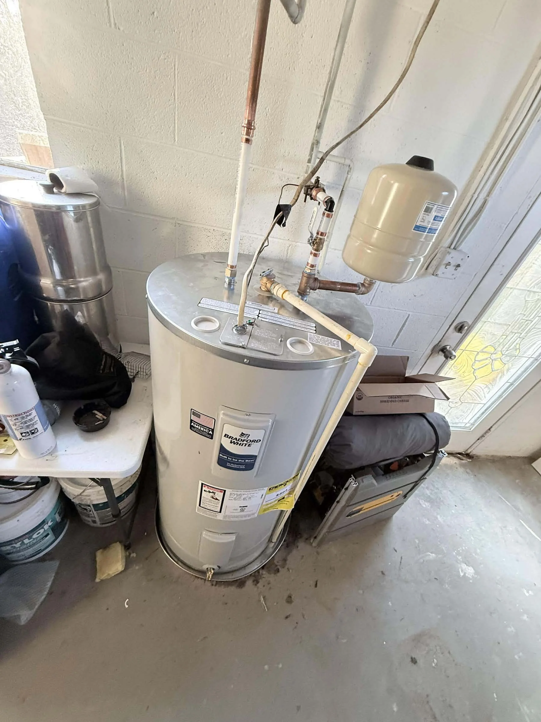 Electric water heater replacements, includes new pan, thermal expansion tank and shut off valves.