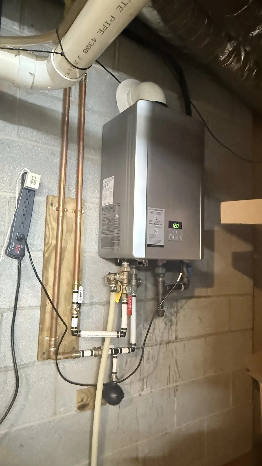 Tankless water heater upgrades and recirculation solutions