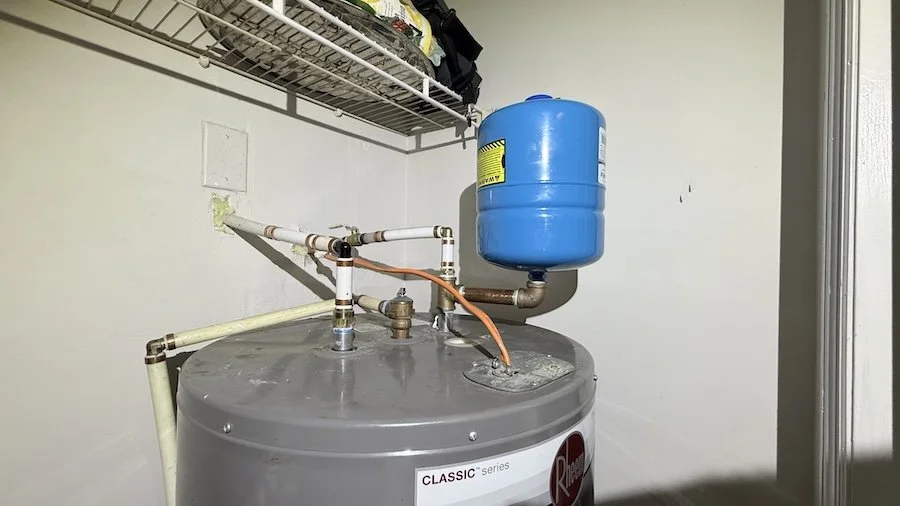 Electric water heater replacement and upgrades to North Carolina Code with properly supported thermal expansion tanks.