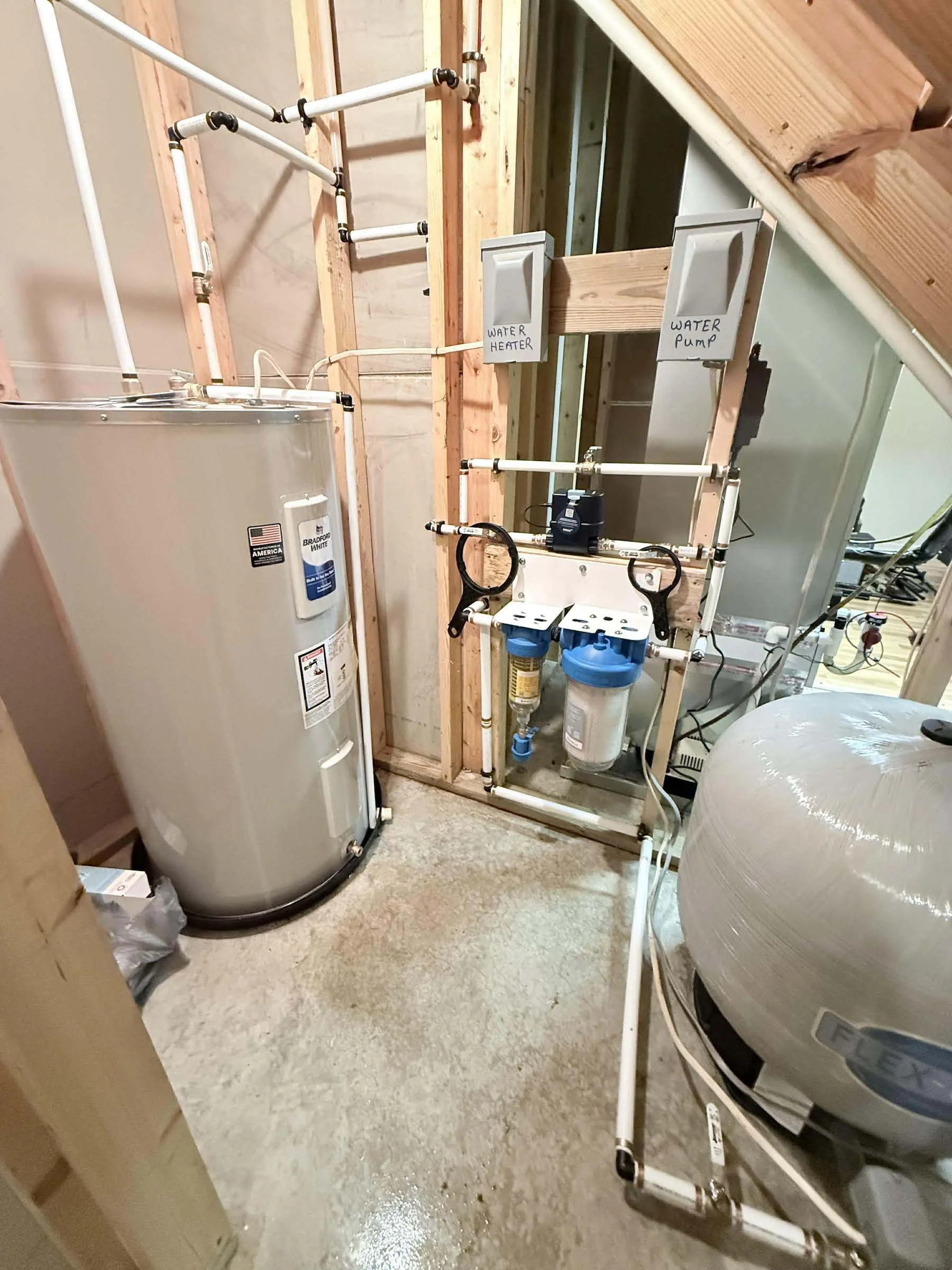 Well water pressure tank and filtration improvements